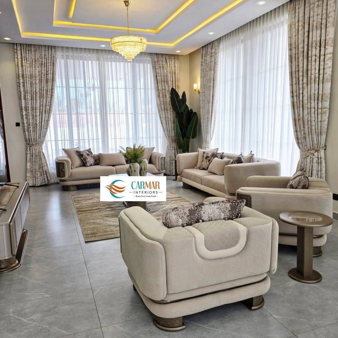 Living room with full-height curtains and sheers